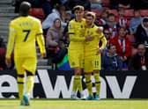 Kai Havertz (C) celebrates with Chelsea's German striker Timo Werner (R) after scoring the fourth goal  (Photo by ADRIAN DENNIS/AFP via Getty Images)
