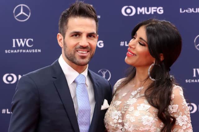 Cesc Fabregas poses on the red carpet with his wife Daniella Semaan. Credit: VALERY HACHE/AFP via Getty Images
