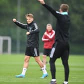 Martin Odegaard celebrates winning a training competition. Credit: Stuart MacFarlane/Arsenal FC via Getty Images