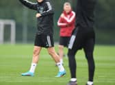 Martin Odegaard celebrates winning a training competition. Credit: Stuart MacFarlane/Arsenal FC via Getty Images