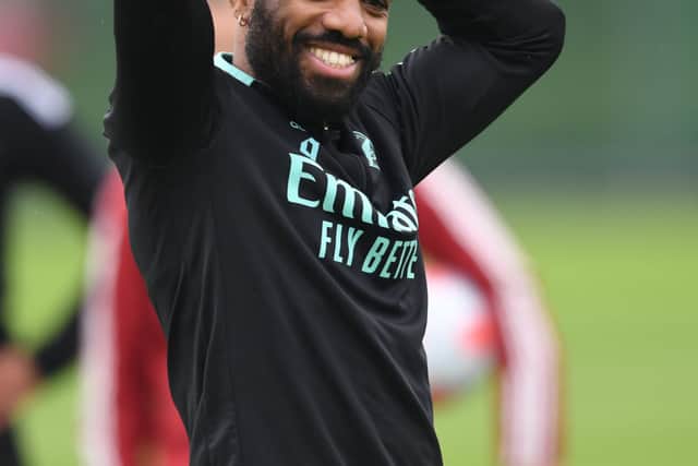 Alex Lacazette is all smiles in training. Credit: Stuart MacFarlane/Arsenal FC via Getty Images