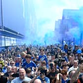 Everton fans wait to greet the team bus ahead of the Premier League match  (Photo by Gareth Copley/Getty Images)