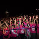 Hundreds of people join together in their free pink t-shirts as they take part in last year’s Midnight Walk to raise money for St Luke’s Hospice (Credit: St Luke’s Hospice)