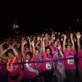 Hundreds of people join together in their free pink t-shirts as they take part in last year’s Midnight Walk to raise money for St Luke’s Hospice (Credit: St Luke’s Hospice)