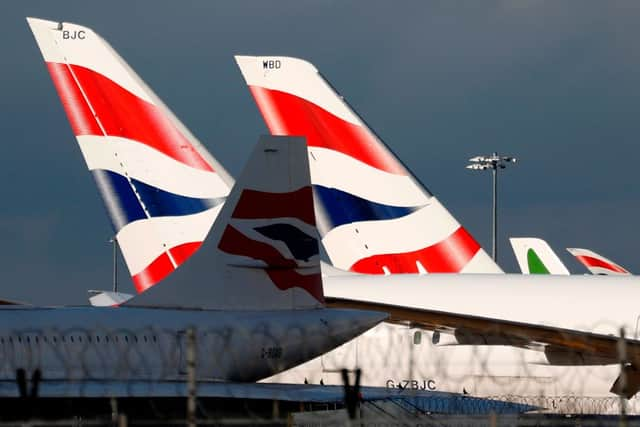 British Airways planes at London Heathrow Airport terminal 5. Credit: ADRIAN DENNIS/AFP via Getty Images