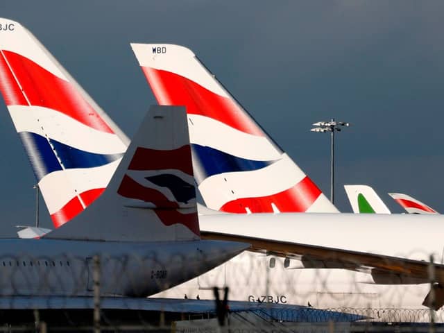 British Airways planes at London Heathrow Airport terminal 5. Credit: ADRIAN DENNIS/AFP via Getty Images