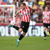Christian Eriksen of Brentford controls the ball during the Premier League match (Photo by Steve Bardens/Getty Images)