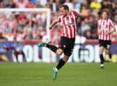 Christian Eriksen of Brentford controls the ball during the Premier League match (Photo by Steve Bardens/Getty Images)