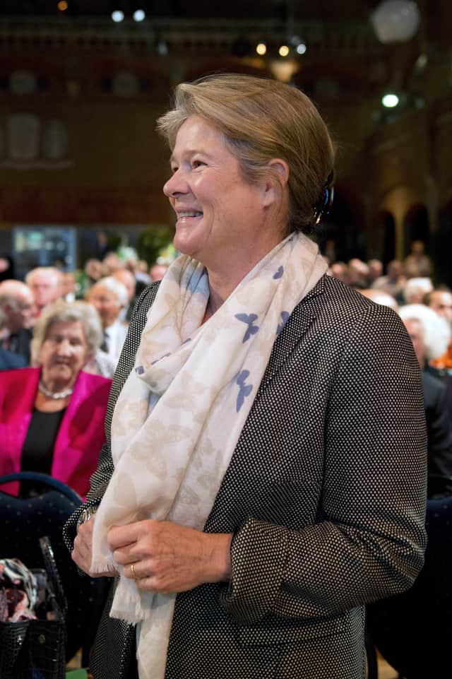 Charlene de Carvalho-Heineken, owner of a controlling interest of Dutch brewer Heineken, smiles during a Heineken shareholders' meeting on the company's financial situation on April 24, 2014 in Amsterdam
