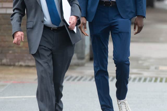 Yoan Zouma (R) at Thames Magistrates Court to appear over allegations filming a cat being kicked by his brother Kurt Zouma London, 24th May 2022. Credit: Tony Kershaw / SWNS