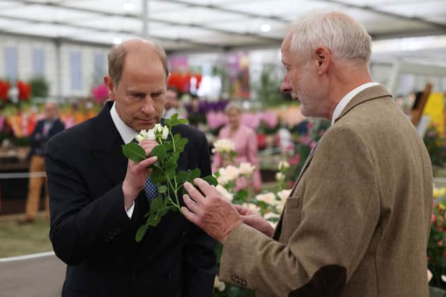Britain’s Prince Edward, Earl of Wessex, smells the John Ystumllyn rose during a tour of the 2022 RHS Chelsea Flower Show in London on May 23, 2022. (Photo: Getty)