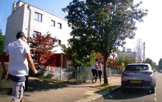 The dash cam captures the moment the three thugs attack the victim. Credit: Met Police