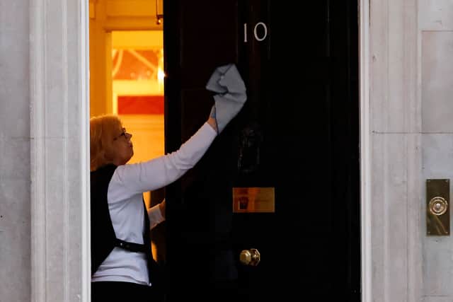 A cleaner working at No10 Downing Street. Photo: Getty
