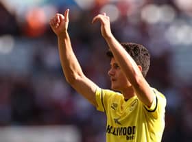 Christian Norgaard of Brentford interacts with the crowd following the Premier League match (Photo by Ryan Pierse/Getty Images)