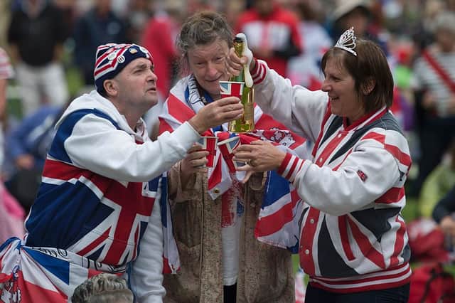 Brits will be celebrating the Platinum Jubilee with street parties. Credit: OLI SCARFF/AFP via Getty Images