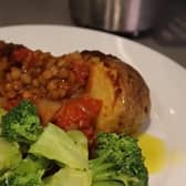 Claudia Marquis’ lentil stew with a baked potato and broccoli.