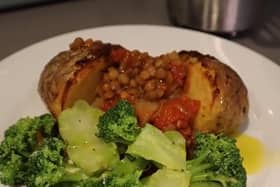 Claudia Marquis’ lentil stew with a baked potato and broccoli.