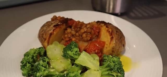Claudia Marquis’ lentil stew with a baked potato and broccoli.