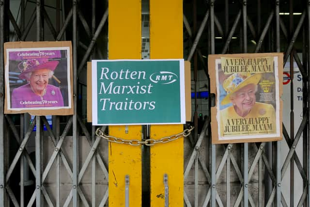  A poster reading ‘Rotten Marxist Traitors’ has been pasted on the closed gates at Shepherd’s Bush station.