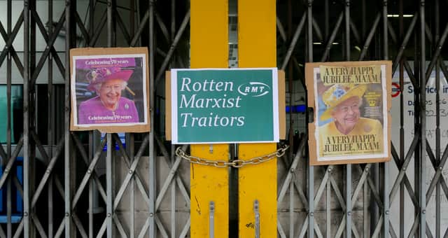  A poster reading ‘Rotten Marxist Traitors’ has been pasted on the closed gates at Shepherd’s Bush station.