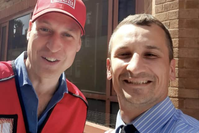 Jan Begala, 34, right, bagged a selfie with Prince William while he was selling the Big Issue. Credit: Jan Begala / SWNS