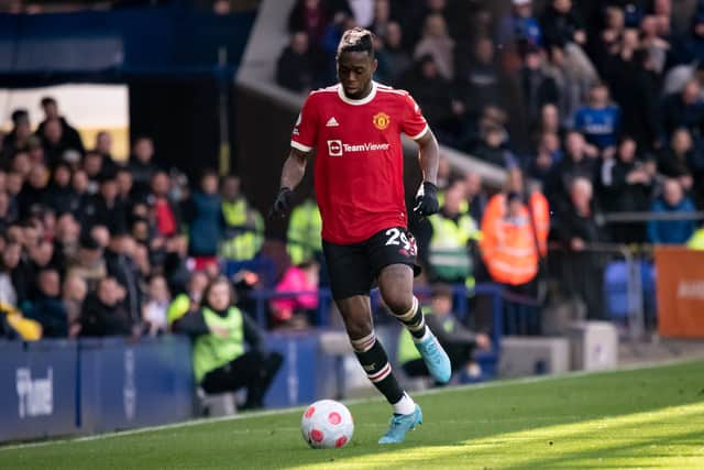 Aaron Wan-Bissaka of Manchester United in action during the Premier League match (Photo by Ash Donelon/Manchester United via Getty Images)