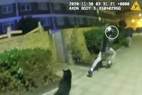 Video grab of Mucktar Khan pointing a firearm (white circle) at PC Elwood during pursuit. Credit: Metropolitan Police / SWNS