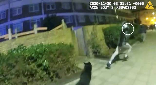 Video grab of Mucktar Khan pointing a firearm (white circle) at PC Elwood during pursuit. Credit: Metropolitan Police / SWNS