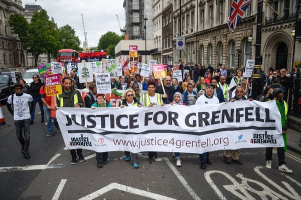 Members of the Justice for Grenfell group march down Whitehall. Photo: Getty