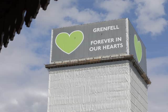 A covered Grenfell tower stands on June 14, 2020 in London, England. Photo: Getty