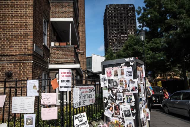 Tributes are left near Grenfell Tower on June 26, 2017 in London, England. Photo: Getty