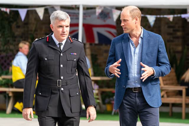 LFB chief Andy Roe, left, with Prince William on Emergency Services Day. Photo: Getty