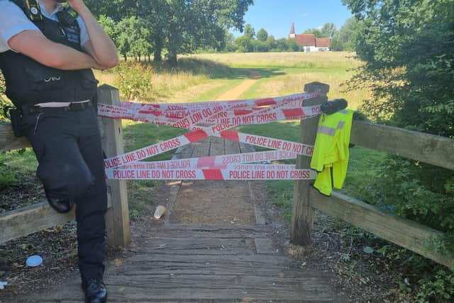 Police have cordoned off Belvue Park in Northolt after a burnt body was found. Photo: LW