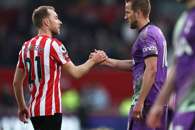 Harry Kane of Tottenham Hotspur embraces Christian Eriksen of Brentford after the Premier League (Photo by Ryan Pierse/Getty Images)