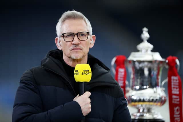 Gary Lineker, BBC Sport TV Pundit looks on whilst standing next to the FA Cup (Photo by Alex Pantling/Getty Images)