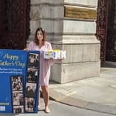 Roxanne Tahbaz outside the Foreign Office with a Father’s Day card and gift for her father Morad