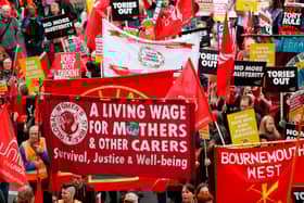 Protesters march with placards and trades union banners during a demonstration organised by the Trades Union Congress (TUC) in 2018. (Photo: Getty)