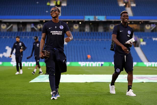Gaetan Bong and Yves Bissouma of Brighton and Hove Albion inspects the pitch (Photo by Bryn Lennon/Getty Images)