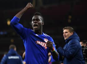  Pape Abou Cisse of Olympiacos FC celebrates victory after the UEFA Europa League (Photo by Mike Hewitt/Getty Images)