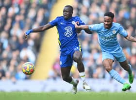 Sterling battles with Chelsea’s Malang Sarr in January 2022. 