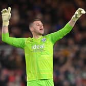 WBA goalkeeper  Sam Johnstone celebrates the West Brom goal during the Sky Bet  (Photo by Stu Forster/Getty Images)