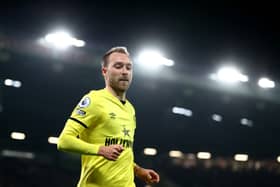 Christian Eriksen of Brentford looks on during the Premier League match between Manchester United  (Photo by Naomi Baker/Getty Images)