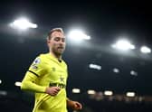 Christian Eriksen of Brentford looks on during the Premier League match between Manchester United  (Photo by Naomi Baker/Getty Images)