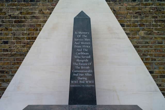 An event to mark Windrush Day takes place beside the memorial honouring the two million African and Caribbean military servicemen and women who served in World War I and World War II, in Windrush Square on June 22, 2021 in London, England (Photo by Dan Kitwood/Getty Images)