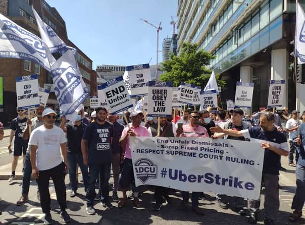 <p>Around 400 Uber drivers attended Uber offices in London for a protest rally and march. Photo: ADCU </p>