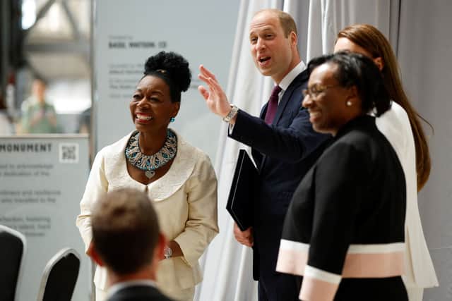 Prince William (C), Duke of Cambridge, and Baroness Floella Benjamin (L) arrive to attend the unveiling of the National Windrush Monument. Photo: Getty