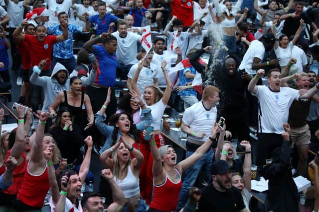 Fans celebrating an England goal against Denmark in the men’s Euros