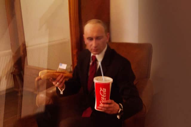 Putin with a hotdog and coke. Credit: Alison Jackson