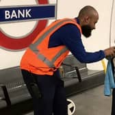 This is the adorable moment London Underground worker lets a train-obsessed toddler announce an incoming train. Credit: Ifat Batul Sementilli / SWNS