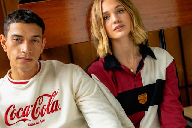 Cream 86 Coca-Cola Sweatshirt, £100 and Red Cantrix Rugby Shirt, £95 (Alma De Ace)